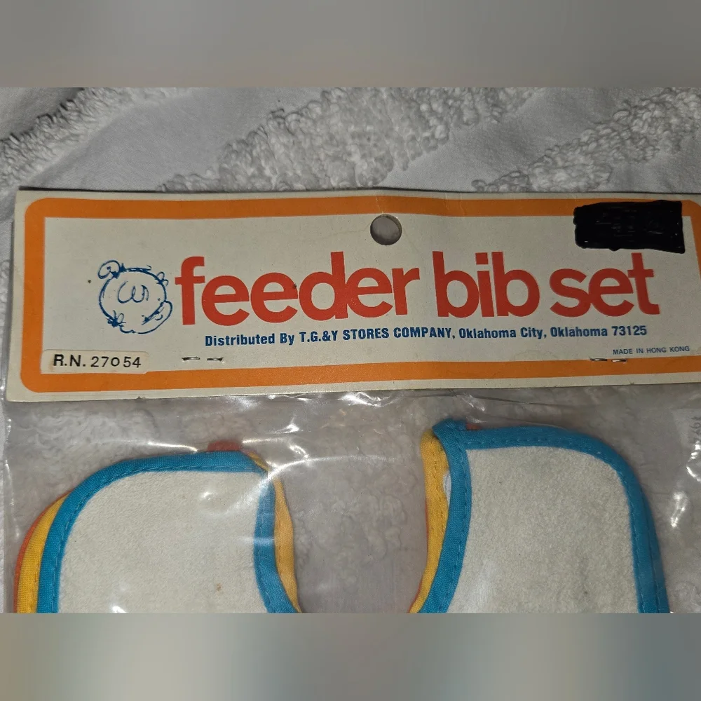 Vintage NOS NIP 7 Piece Feeder Bib Set Cotton Terry Day Of Week Multicolor